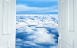 Doors opening to a heavenly sight of fluffy clouds