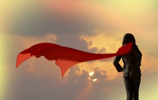 3D Illustration of business woman dressed in a suit with a Cape superhero on a background the sky